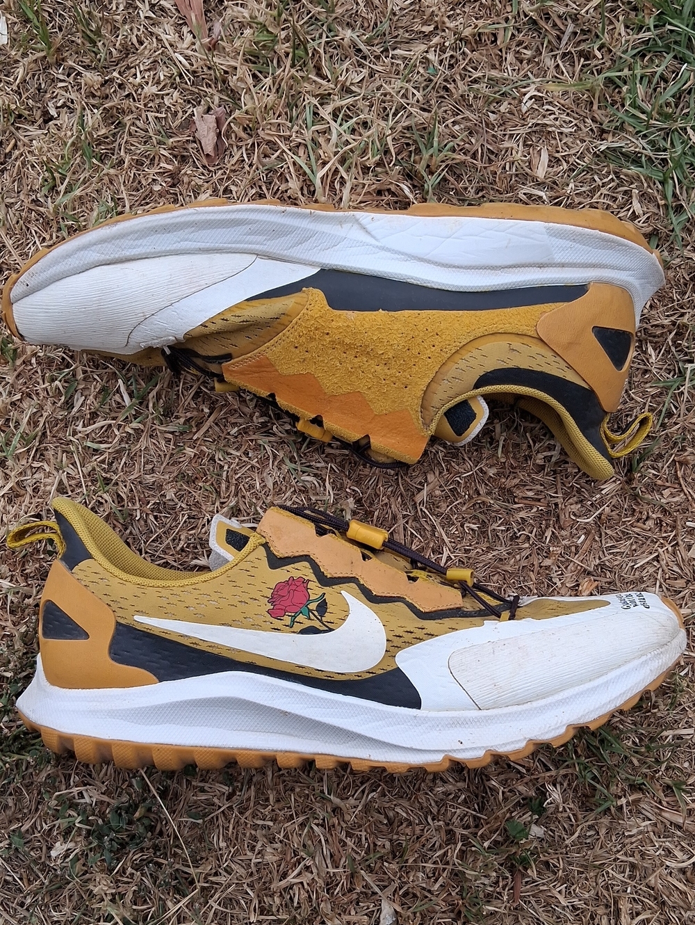 Nike Men’s Yellow and White Trail Running Shoes with Rose Graphic